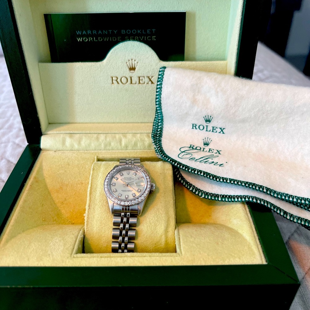 Rolex White gold stainless steel with bezxles on dial